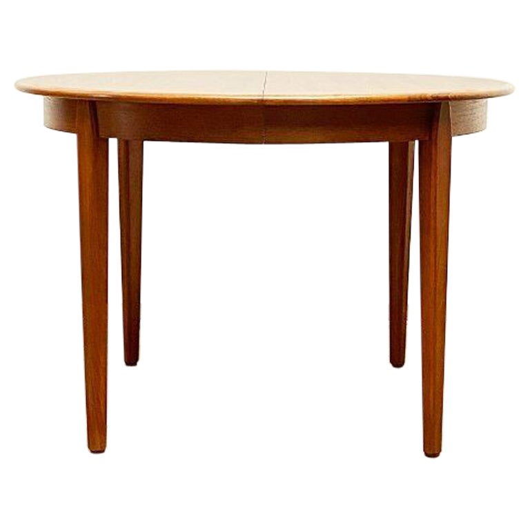 Rosewood Round Dining Table by H. Sign and Sons at 1stDibs