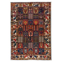 Mehrfarbiger antiker persischer Bakhtiari handgefertigter Allover-Teppich aus Wolle
