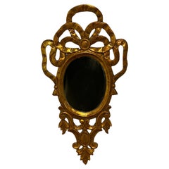 Gilded and Carved Ribbon Bow and Foliate Spanish Mirror