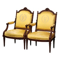 Pair of 19th Century French Louis XVI Carved Walnut Carved Fauteuils Armchairs