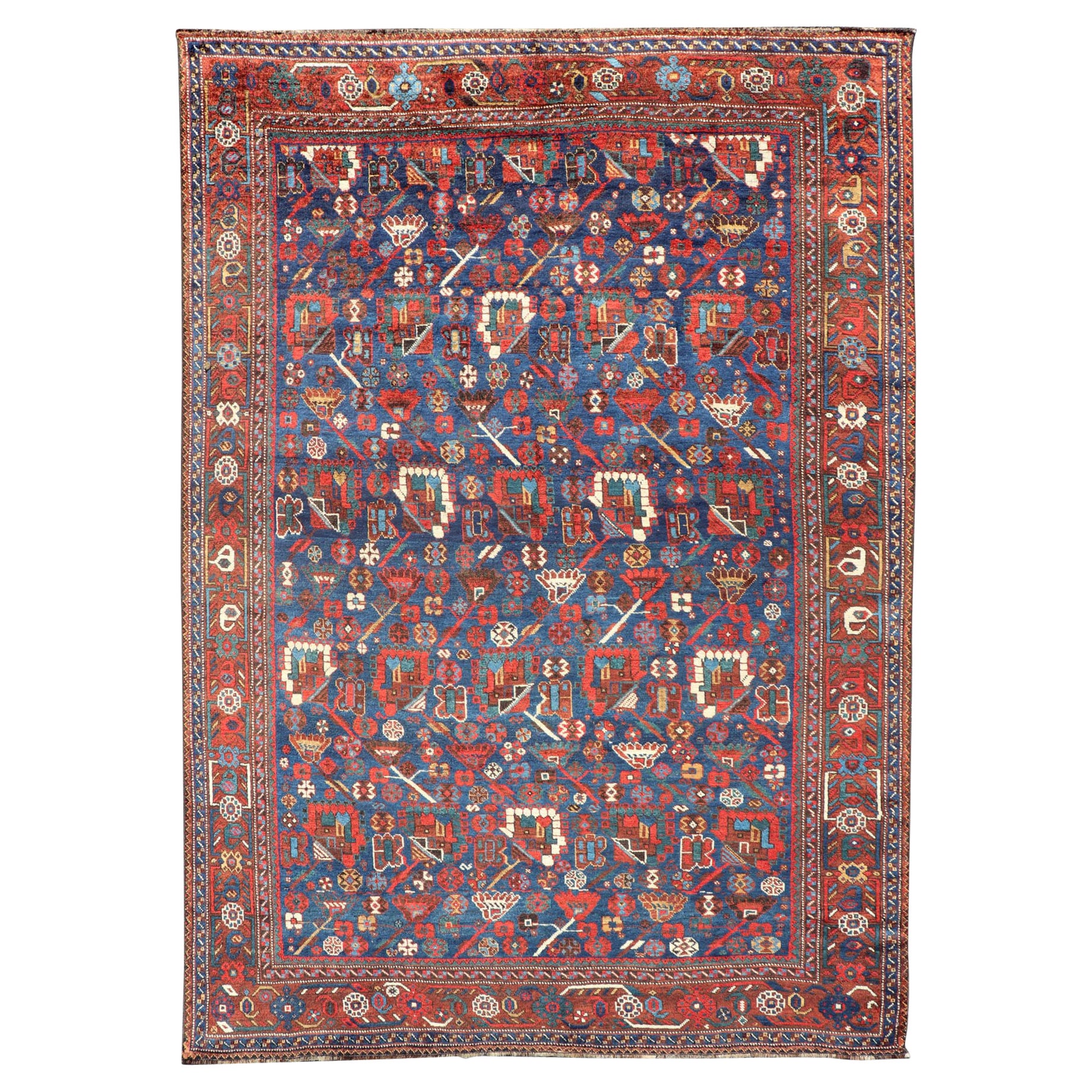 Ancien tapis persan Qashqai Shiraz tribal avec motif tribal sur toute sa surface