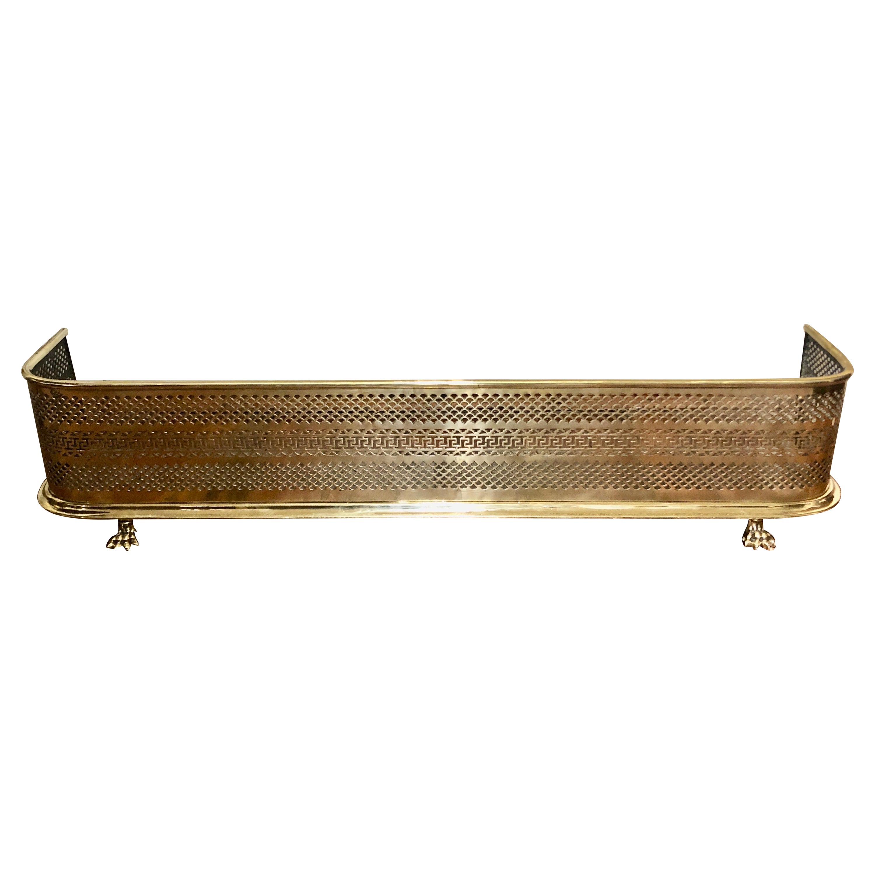 Fabulous Geo. IV English Pierced Brass Fireplace Fender with Cast Brass Paw Feet For Sale