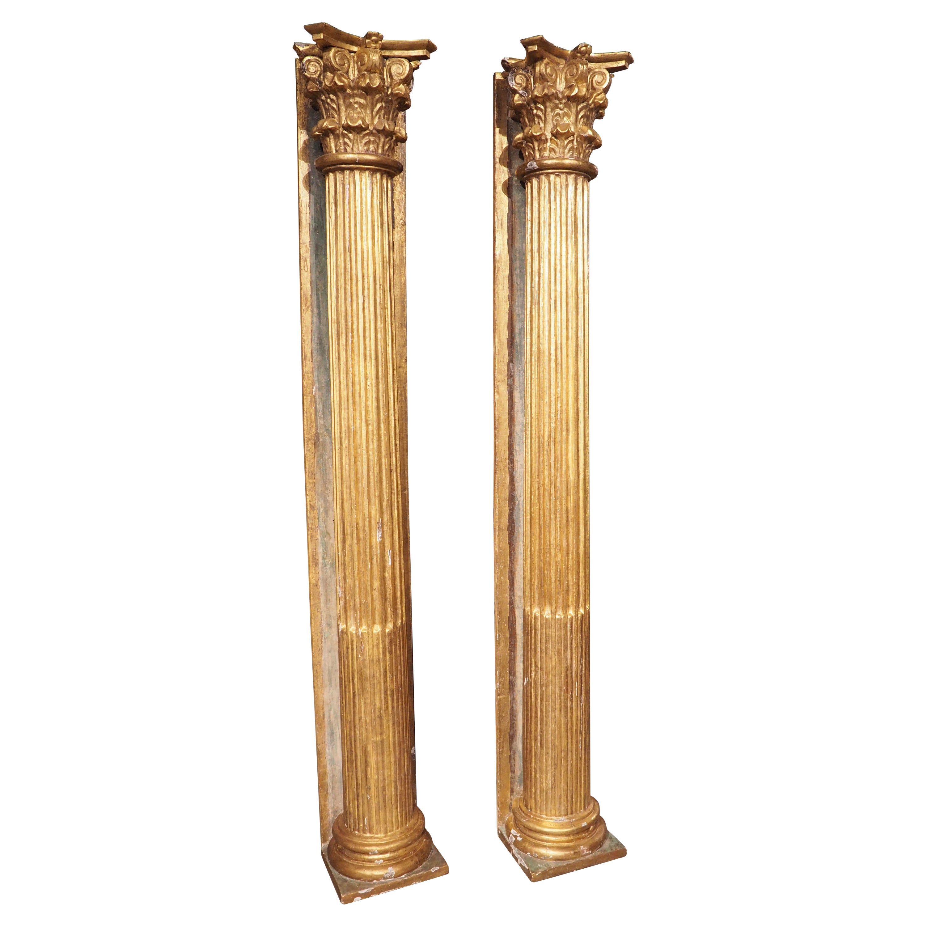 Pair of Tall French Neoclassical Giltwood Columns, Circa 1810