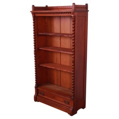Antique Victorian Carved Solid Cherry Wood Bookcase, Circa 1880s