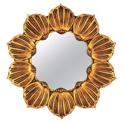Hollywood Regency Carved Giltwood Sunburst Flower Mirror, Spain, 1950s