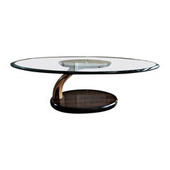 Table basse Henredon en bois rare et plateau en verre biseauté, avec différents bois