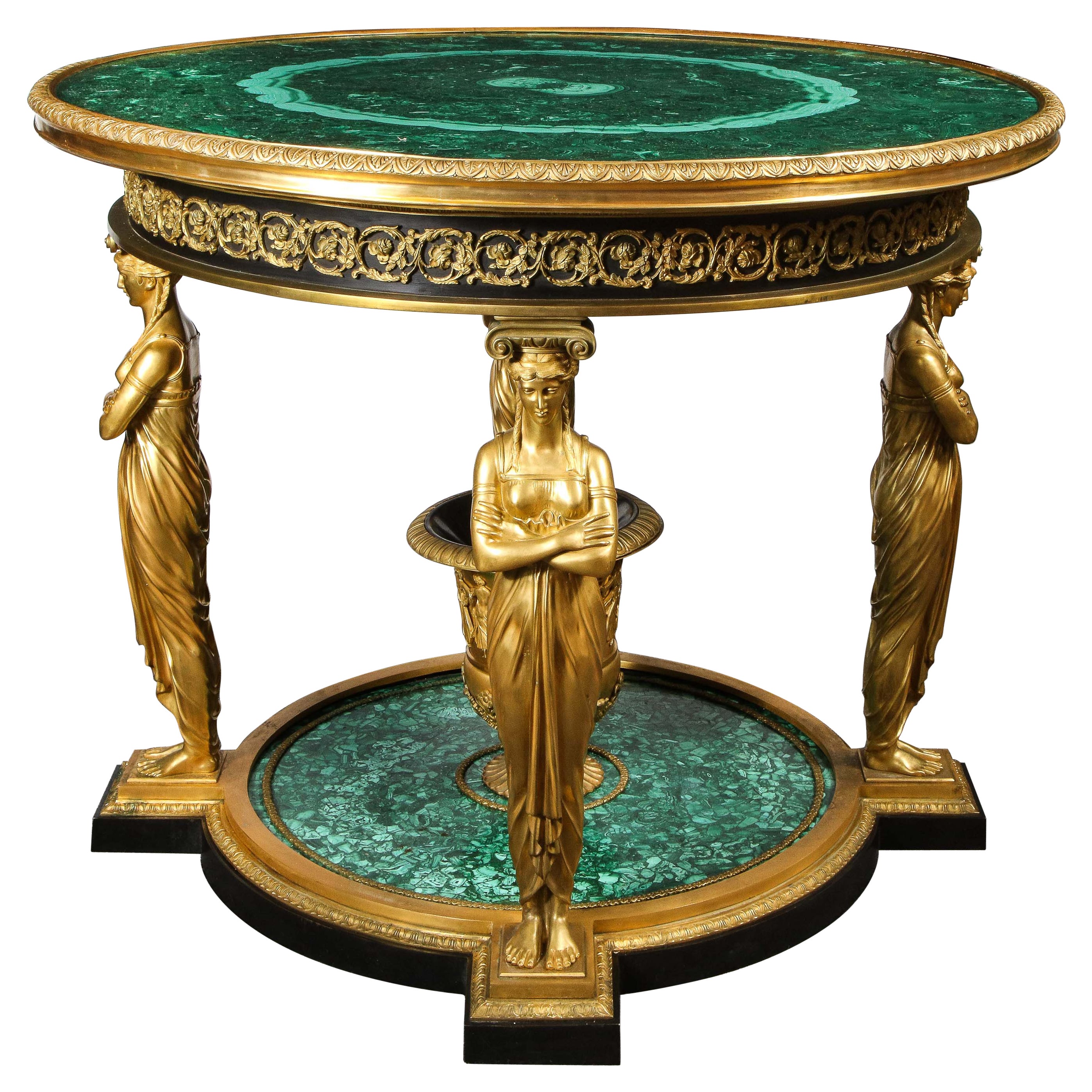 Impressionnante table centrale de style Empire en malachite et bronze doré d'après Desmalter