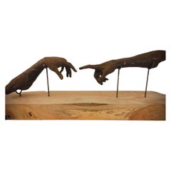 Français, mains en bronze, Ancora Imparo, de Hugues Scheid