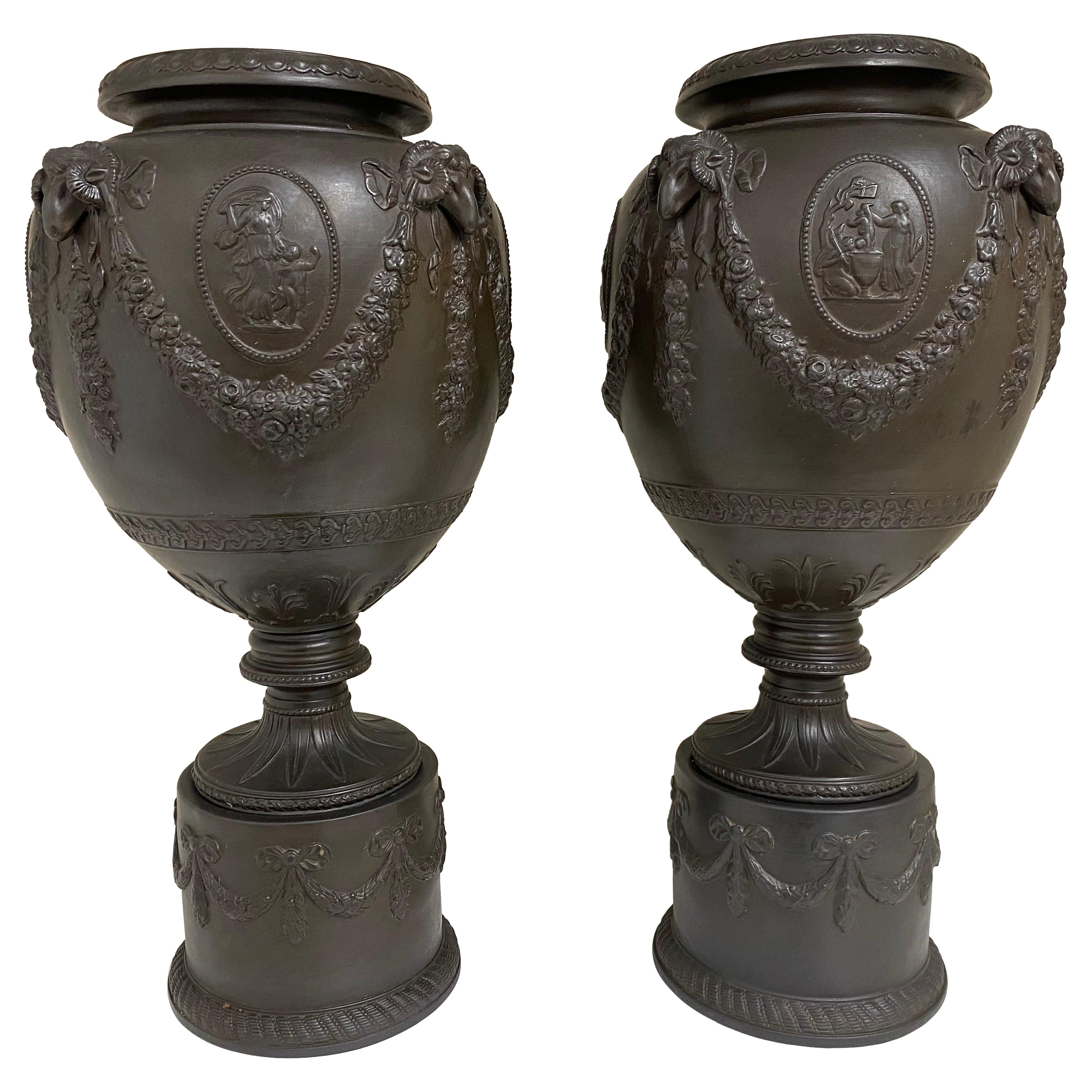Pair of Ceramic Basalt Relief Urns Attributed to Wedgwood For Sale