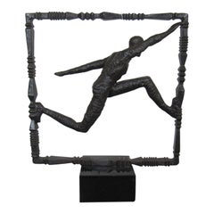Iron Sculpture of Running Figure