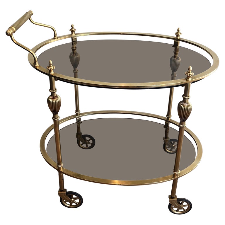 Maison Jansen Style Ovale Brass Bar Cart with Smoked Glass Shelves For Sale