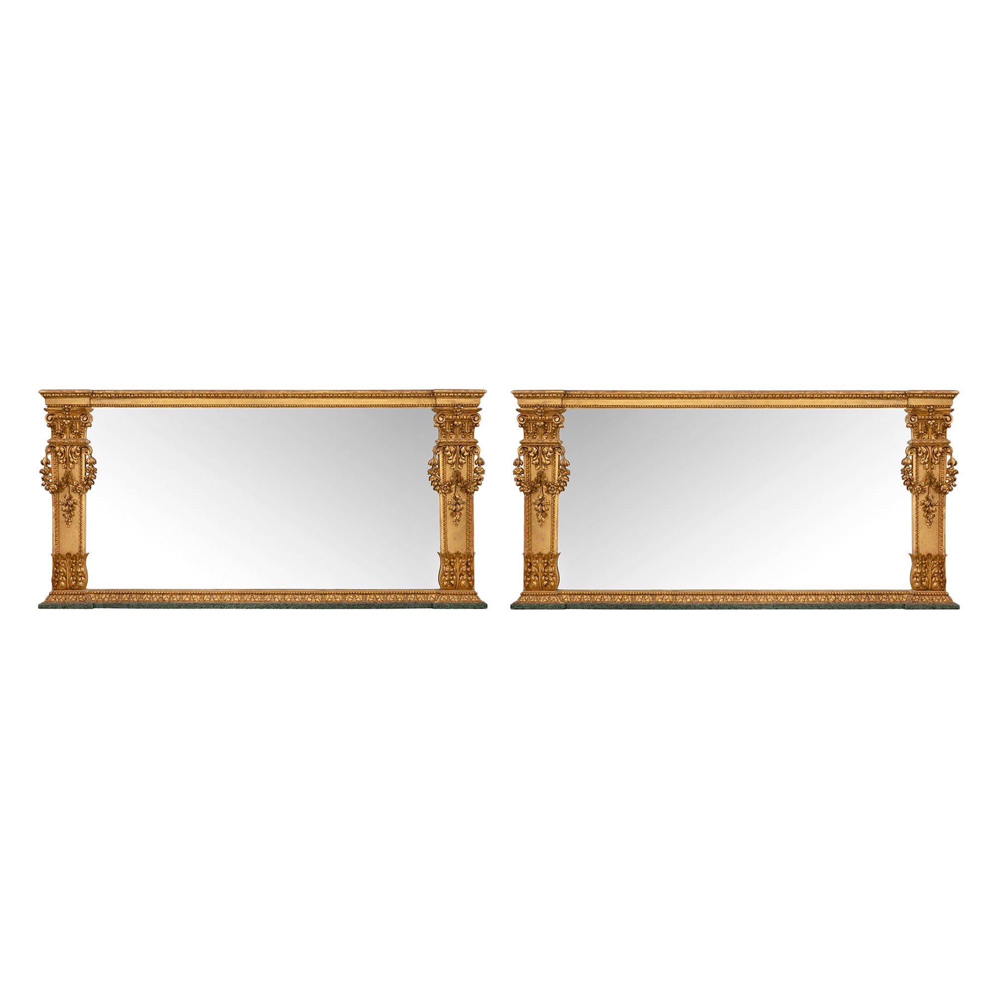 Paire de miroirs italiens en bois patiné et doré du début du XIXe siècle en vente