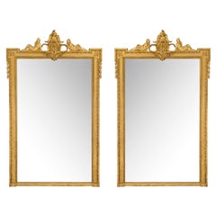 Pair of French Mid 19th Century Louis XVI St. Giltwood Mirrors