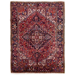 Antiker persischer Heriz handgefertigter Teppich aus roter Wolle mit Medaillonmuster