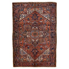 Antiker persischer Heriz handgefertigter Teppich aus rostfarbener Wolle mit Medaillonmuster 