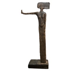 African Bronzed Resin Sculpture of a Standing Woman