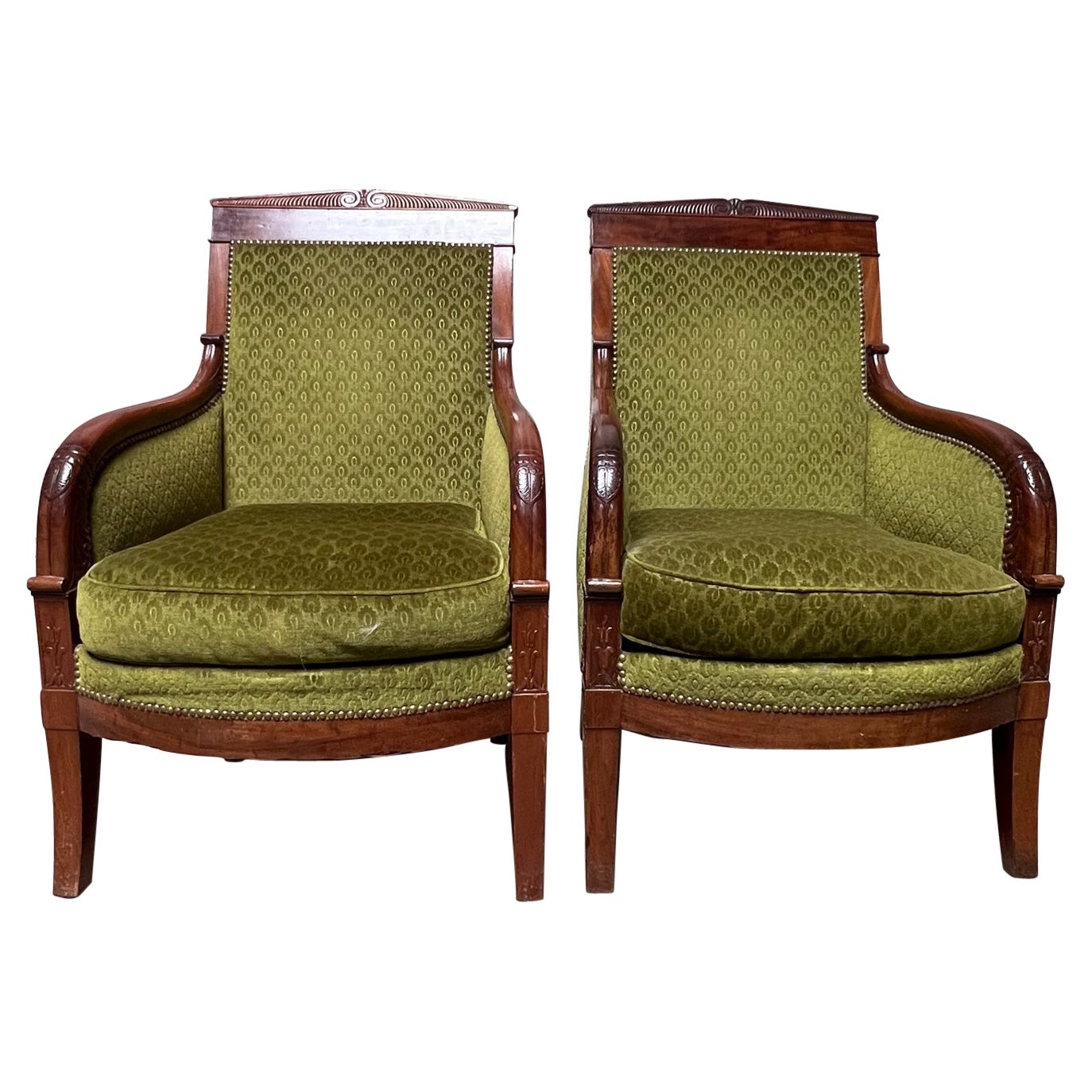 Paire de grands fauteuils français Bergères en acajou de style Charles X