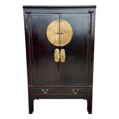 Antique Chinese Wedding Cabinet Black on Red Lacquer with Circular Brass Medallion
