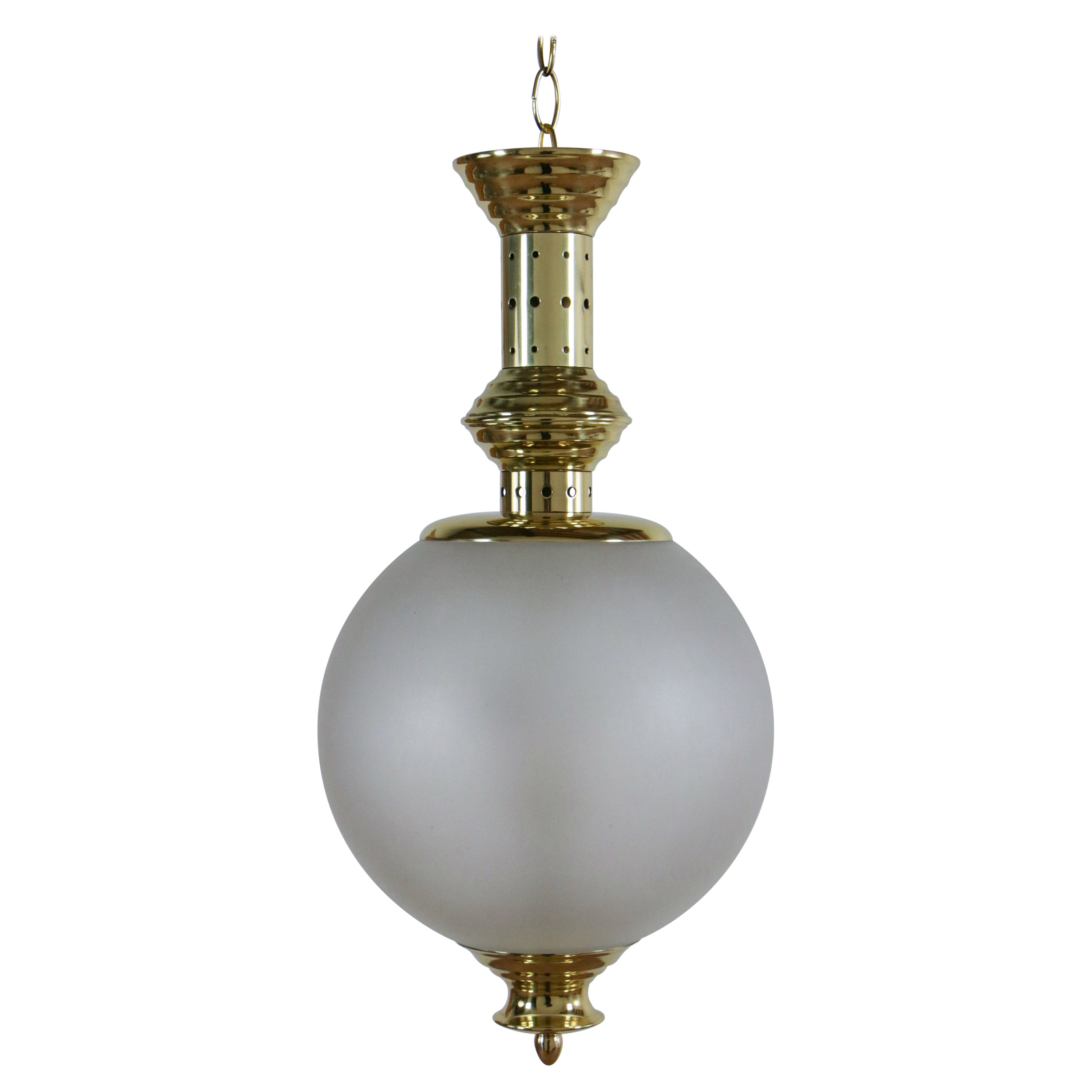 An Italian mid-century pendant lamp, Azucena style, with brass and satin glass, two light E14 formats. It has a great executive quality in the brass parts and a fantastic contrast between the polished brass and the satin glass. We recommend that you