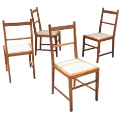 Brazilian Chairs 60s in Solid Caviúna Wood and Courvin, Set of 4