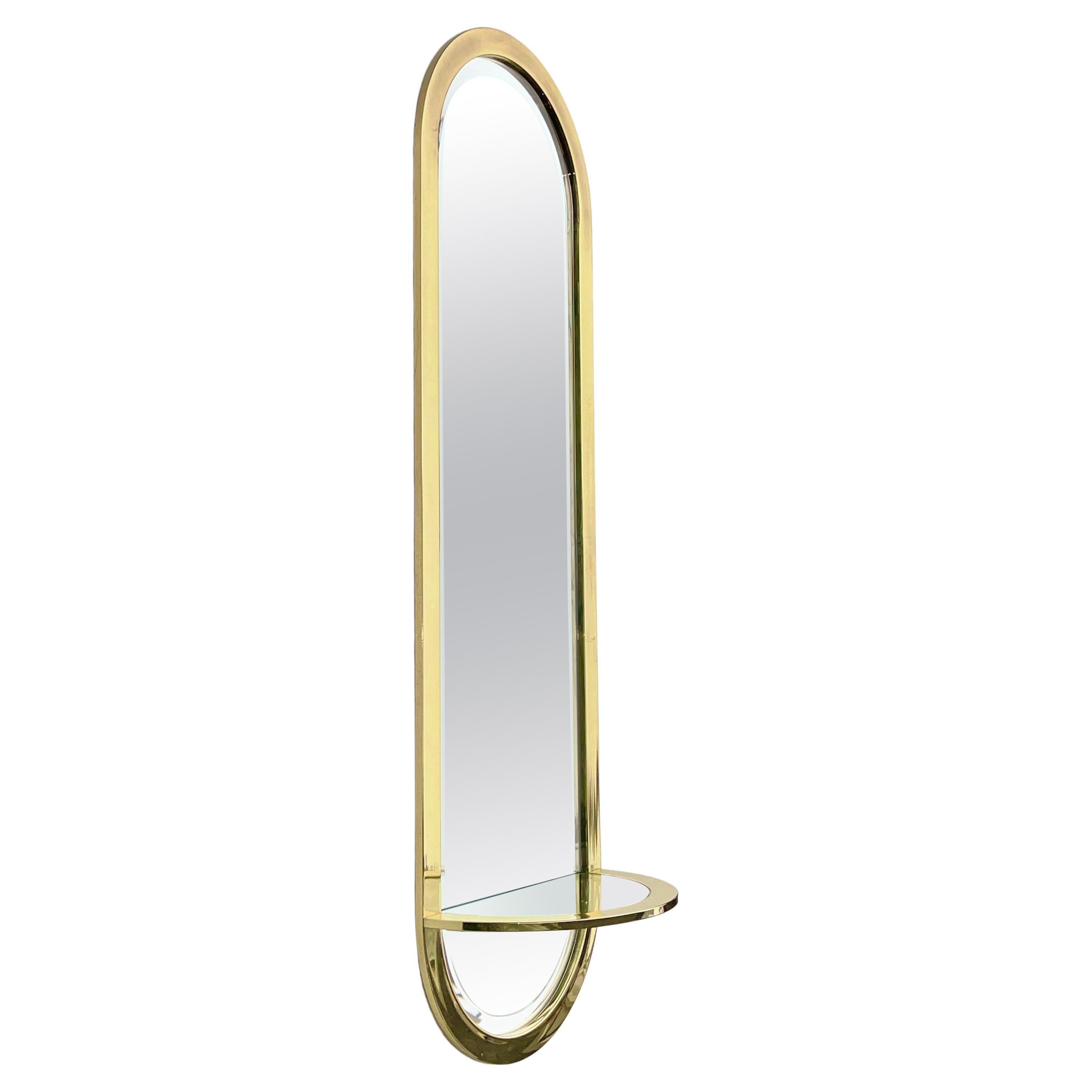 DIA Design Institute America Brass Racetrack Oval Mirror with Demilune Shelf For Sale
