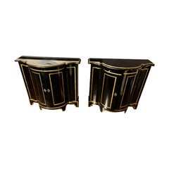 Pair of Ebonized and Gilt Demi-Lune Cabinets by Baker Furniture Co