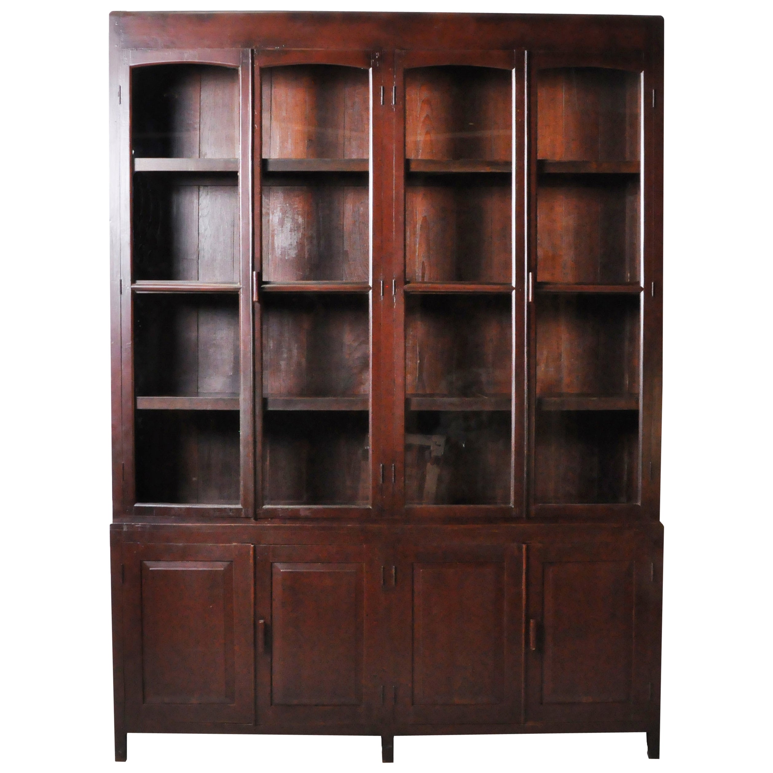 British Colonial Bookcase with Sliding Doors at 1stDibs