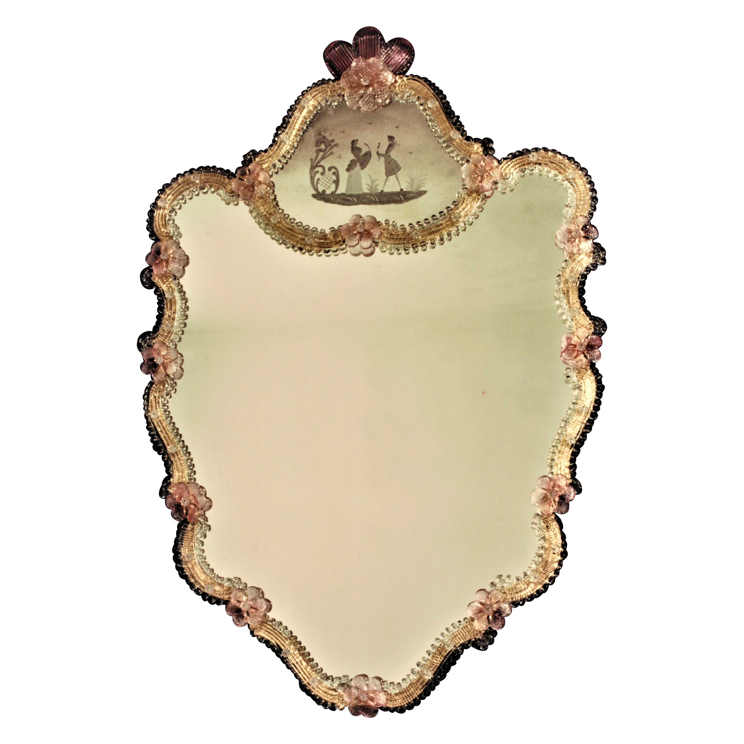 Murano glass mirror in Venetian style, made by Fratelli Tosi,
composed of a crystal frame on a gold background in Murano glass, embellished with Ruby colored flowers and leaves, the upper part of the mirror is engraved with a classic Venetian 