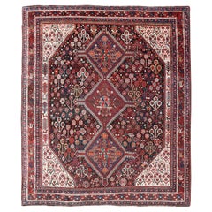 Antique Hand-Knotted Persian Qashqai Rug in Wool with All-Over Tribal Design