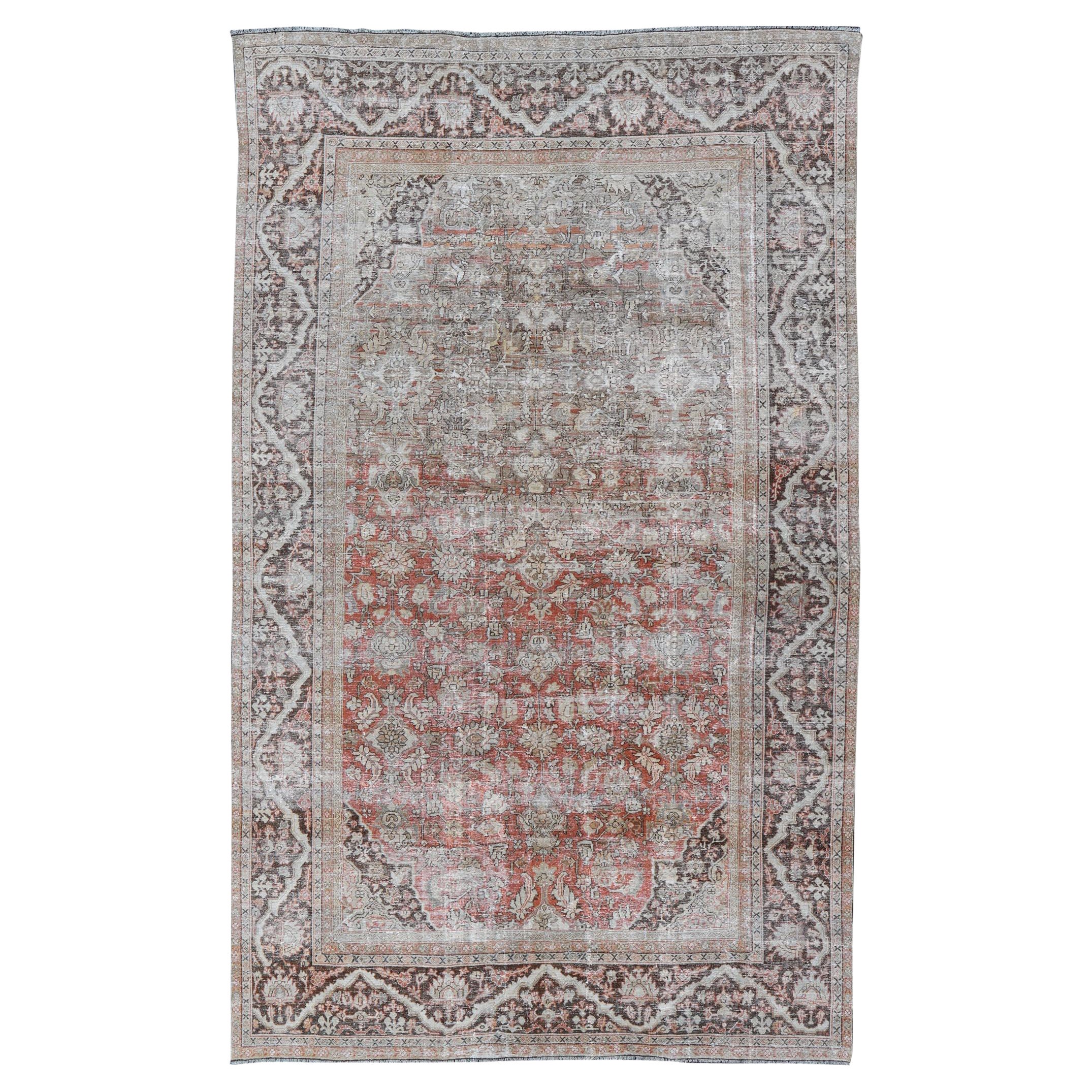 Distressed Antique Persian Sultanabad Rug in Wool with Floral Design For Sale