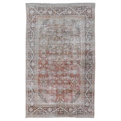 Distressed Antique Persian Sultanabad Rug in Wool with Floral Design