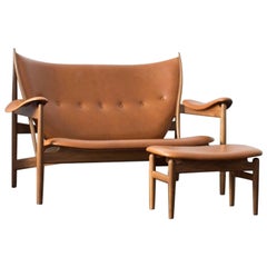 Set of Chieftain Sofa Couch and Chieftain Stool in Wood and Leather by Finn Juhl