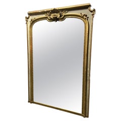 Grande specchio francese del XIX secolo in legno dorato e cristallo in stile Luigi XVI