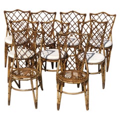 Ensemble de 9 chaises en rotin Louis Sognot vintage du 20ème siècle, 1960