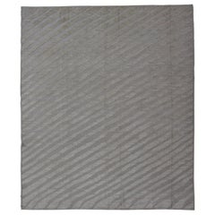 Tapis moderne en laine avec motif linéaire incliné sous-géométrique en crème et taupe
