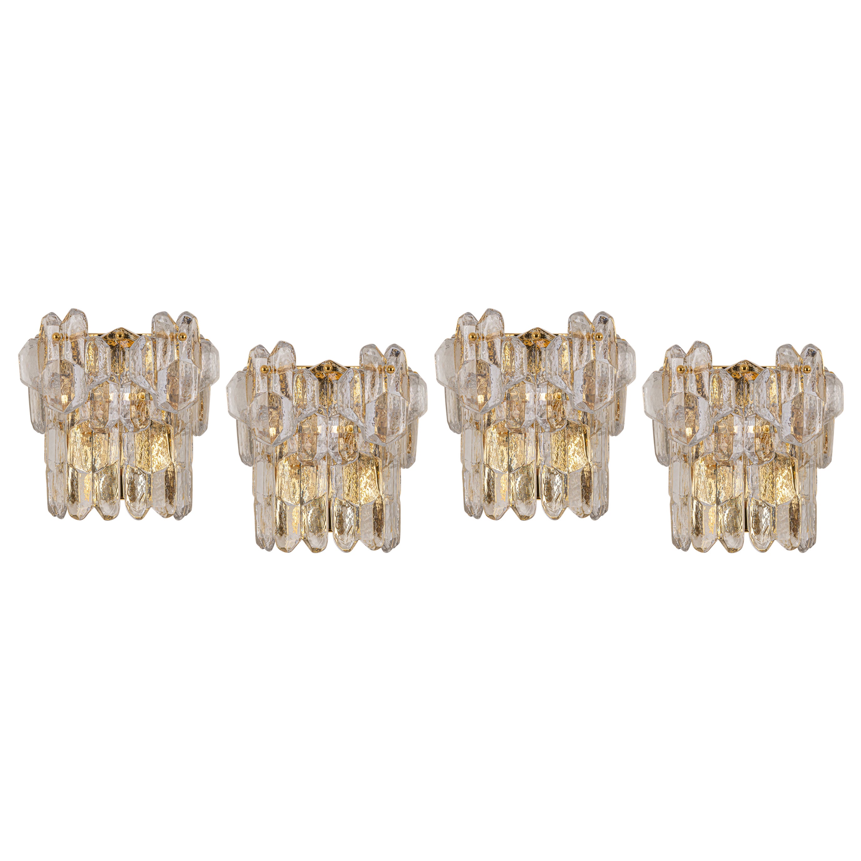 Wonderful pair of mid-century wall sconces with nine murano glass pieces, made by Kalmar, Austria, manufactured, circa 1960-1969.
2 Pairs are available.
High quality and in very good condition. Cleaned, well-wired and ready to use. 

Each