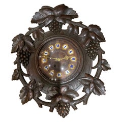 Antique Black Forest hand carved case wall clock