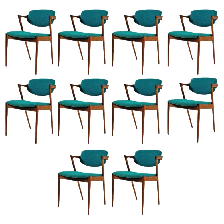 Kai Kristiansen Zehn vollständig restaurierte Teakholz-Esszimmerstühle, maßgefertigte Polsterung enthalten im Angebot