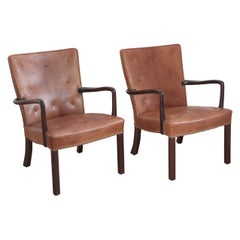 Pair of Jacob Kjær Lounge Chairs in Dark Stained Mahogany and Niger Leather