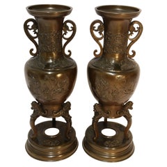 Pair of Meiji Period Japanese Bronze Vases with Mask Head Handles, circa 1900