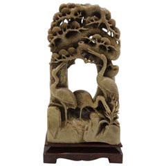 19th century Chinese carved soapstone figure group, on a russet base circa 1900