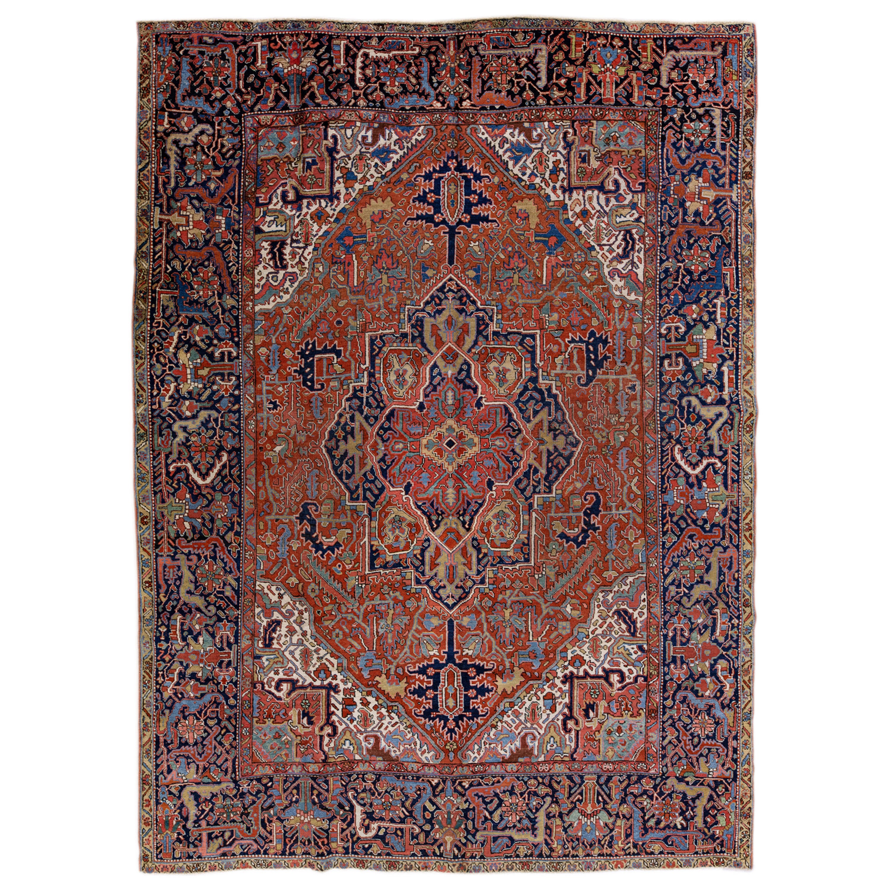  Antique Persian Heriz Handmade Rust Wool Rug with Medallion Design For Sale