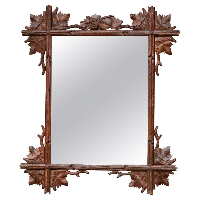 Black Forest Turn of the Century Mirror with Hand-Carved Oak Leaves and Viola For Sale