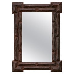 French Turn of the Century Hand Carved Wood Tramp Art Mirror with Dark Patina