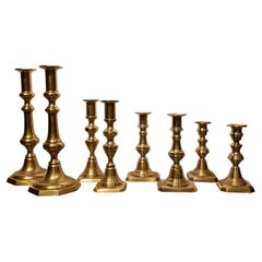 Four Pairs of 19th Century Brass Candlesticks
