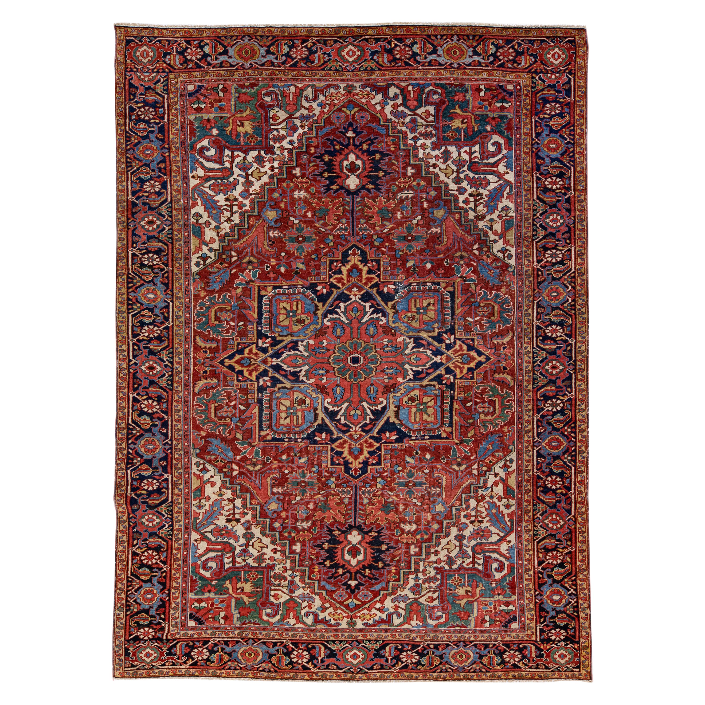 Antique Persian Heriz Red Handmade Wool Rug with Medallion Design For Sale