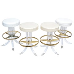 Set of Four Hill Manufacturing Swivel Lucite Bar Stool Brass Plated Footrest 