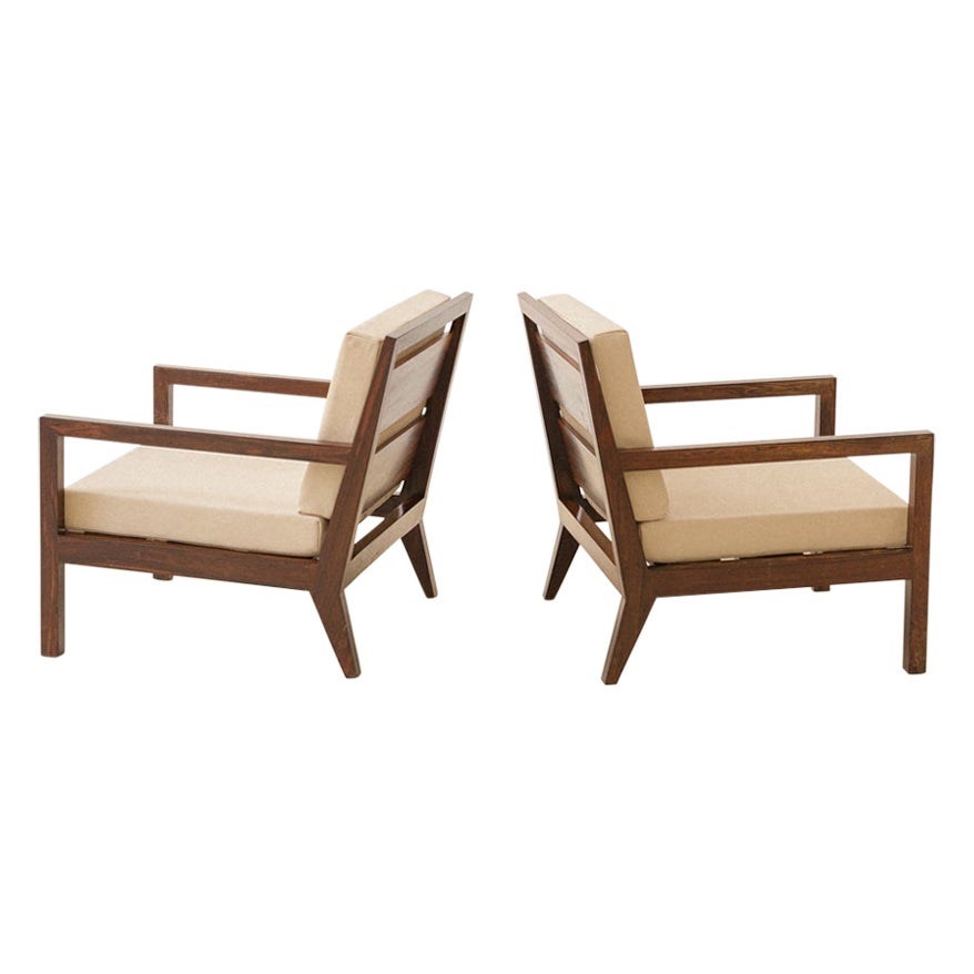 Paire de fauteuils brésiliens du milieu du siècle dernier en bois de rose massif, designer inconnu, années 1960