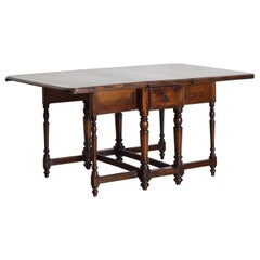 Antique Italian Late Neoclassic Walnut Gateleg Dining Table, ca. 1835