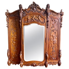 Antique French Belle Époque 3 Door Walnut Armoire with Beveled Mirror Circa 1880